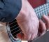 hands on a classical guitar
